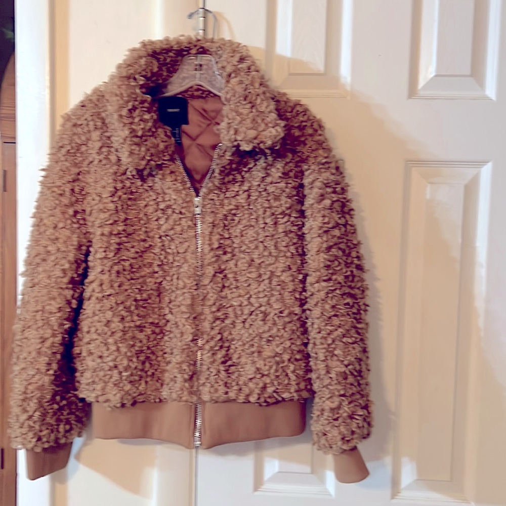 Short waist lambs type Carmel colored womans size medium warm winter jacket